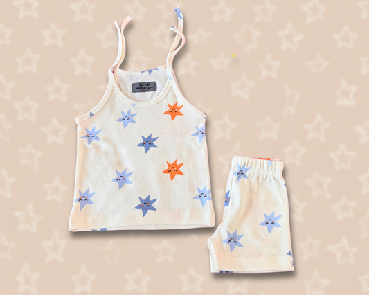 Colourful star prints on off-white kidswear