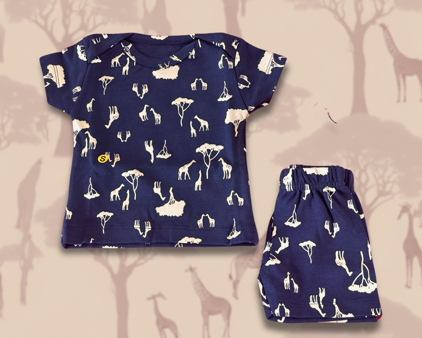 Giraffe and tree prints on navy blue kidswear